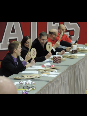 The judges holding up their scores, 12/11/14.