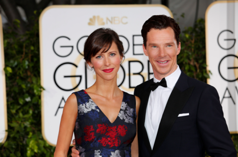 Cumberbatch, pictured here with his wife, has developed a reputation for photobombing. Last year his victim was U2, this year's was Cho.