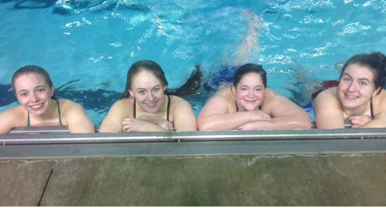 Members of the water polo team look forward to the season with high hopes.