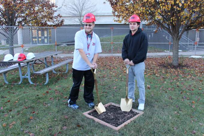 Adam Schlaiss and  Timothy Bonilla break ground for the new ATP building.