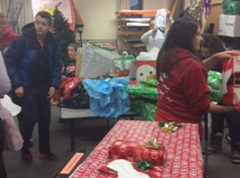 Student council collecting presents for the Adopt an Angel program.