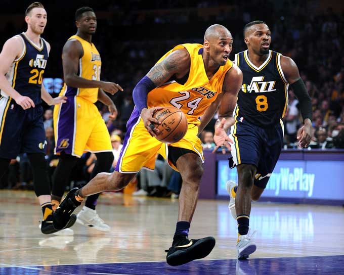 The Los Angeles Lakers Kobe Bryant drives the ball in the third quarter against the Utah Jazz on Wednesday, April 13, 2016, at Staples Center in Los Angeles. Bryant scored 60 points in a 101-96 victory.