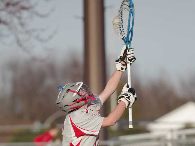 Nick Oswald wearing his number two jersey, but playing his number one favorite sport lacrosse. 