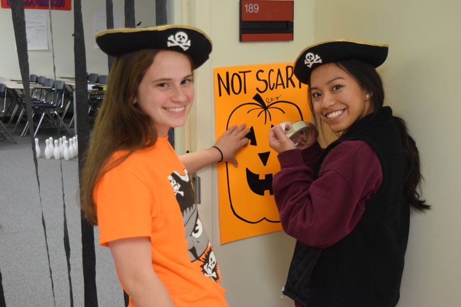 Students set up a room for the 2017 Trick or Treat Fest.