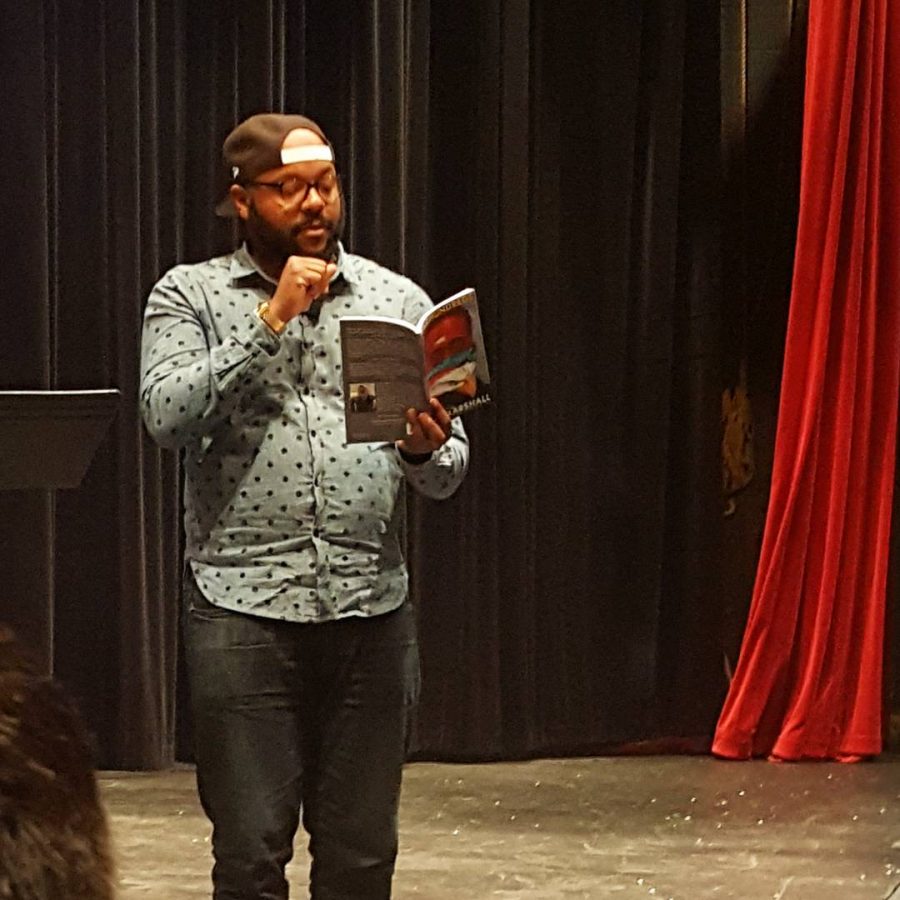 Nate Marshall reads from his book, Wild Hundreds, during PHS Writers Day.