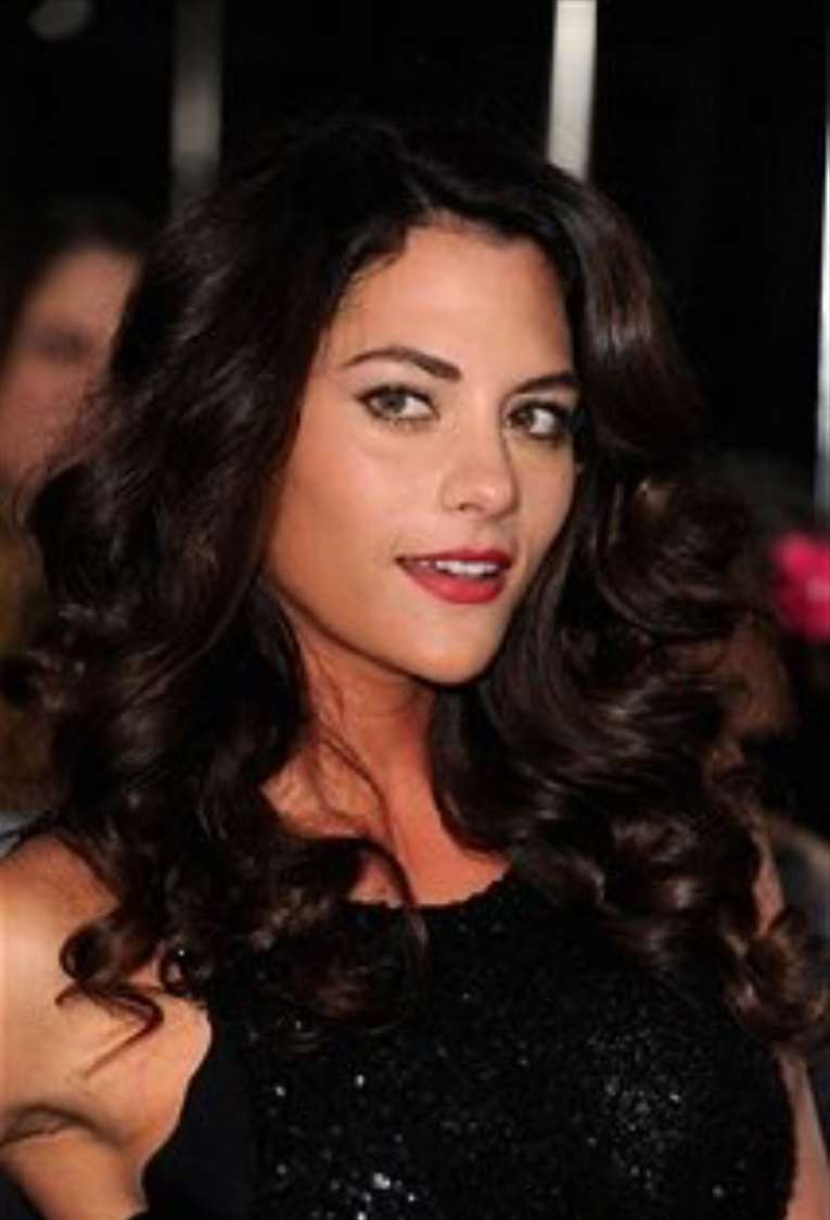 Inbar Lavi, starring actress in Imposters, poses at the premiere of The Twilight Saga: Breaking Dawn Part 2