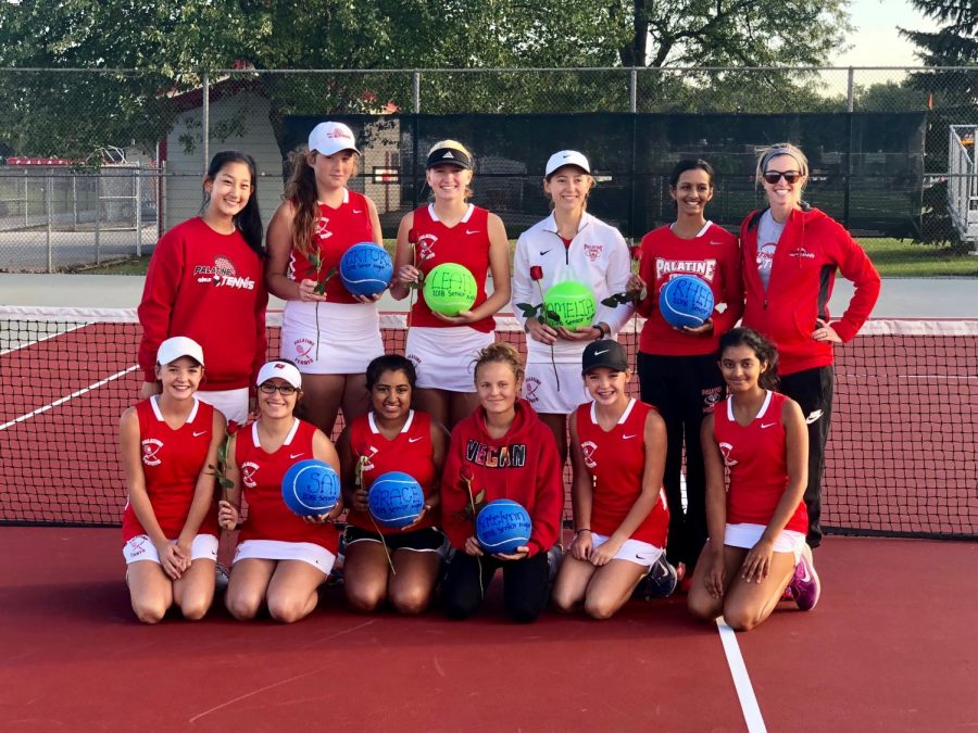 The girls tennis team after an amazing round of wins on their senior night