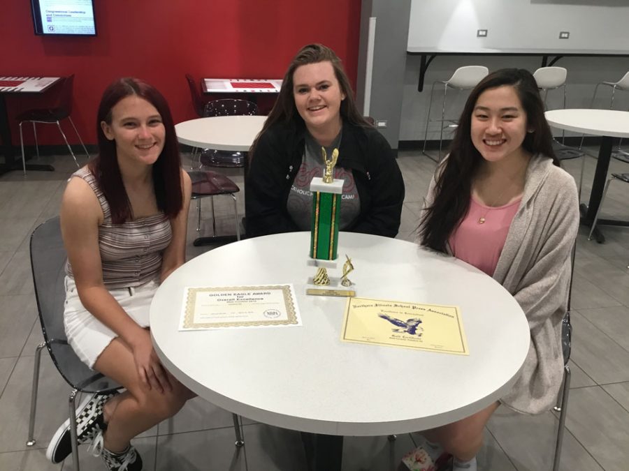 The PHS Cutlass editors show off their 2019 Golden Eagle! One of four news sites in the Illinois to win one.