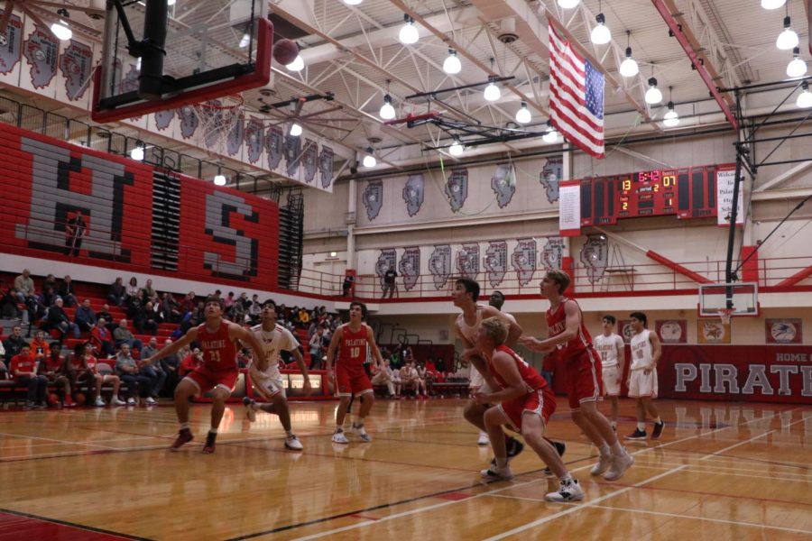 The+Boys+varsity+basketball+team+compete+against+each+other+at+the+Red+and+White+game.