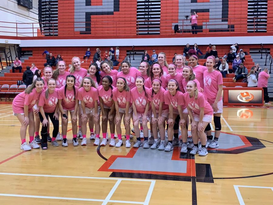 PHS+Girls+Basketball+is+dressed+to+support+Breast+Cancer+at+their+game+against+BHS.