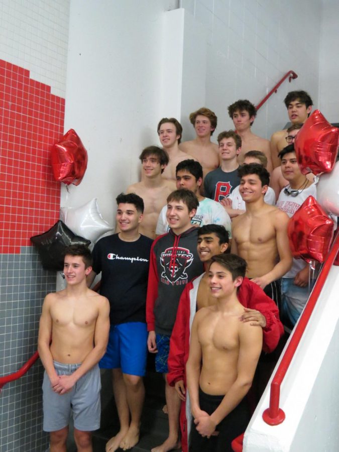 The PHS swim and dive team stand together for a seniors picture.