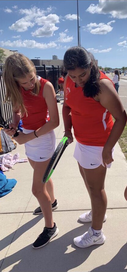 Ishika Mishra (right) and Nicole Canfield (left) are sophomores on the Varsity tennis team after being on Frosh-Soph last year in the 2019 season.