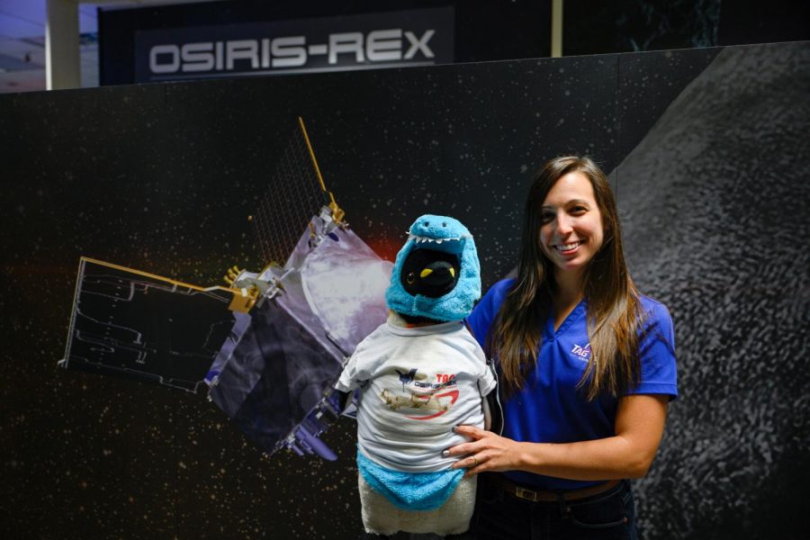 Coralie+Adam+poses+with+PenRex%2C+OSIRIS-REx%E2%80%99s+mascot+ahead+of+the+satellite+landing.+