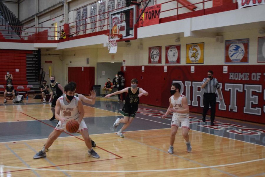 Sam Millstone #5 and Tyler Sweirczek #30 are two of the youngest players on the Palatine High School varsity team. “This season has been such a great opportunity to add a year of varsity basketball under my belt,” Millstone said.