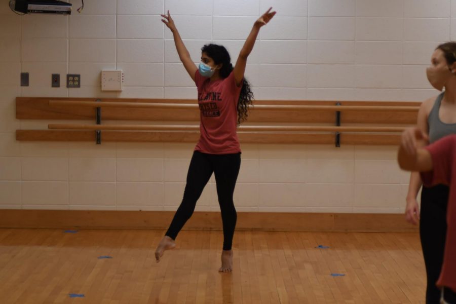 Saroya demonstrates her crafted choreography for her fellow dancers to the song Sparks by Coldplay.
