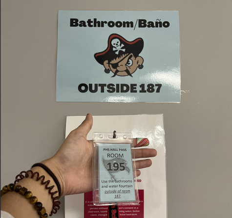 Students use bathroom passes designated only for specific bathrooms. Printed on the passes are the bathrooms for which they can be used.