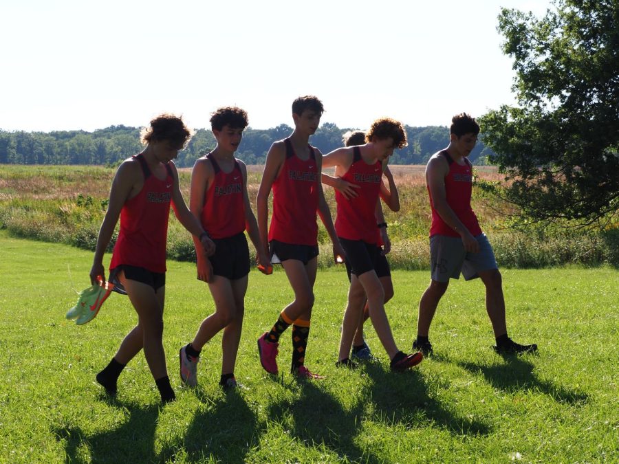 The boys Cross Country team walk together after a tough race.