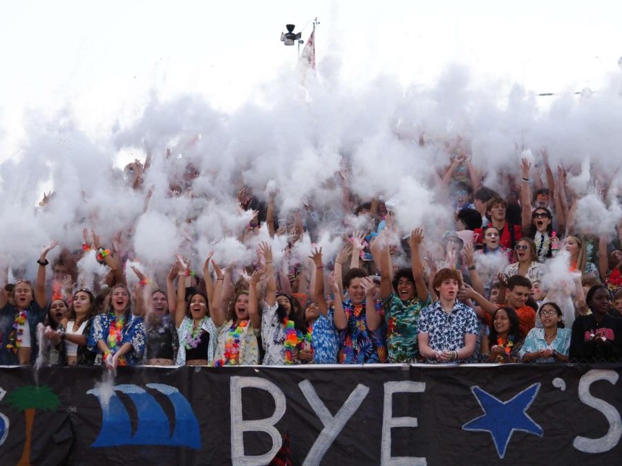As the players kick off, the student section shows their spirit by throwing baby powder. Red Ryders passed this tradition on throughout the years.