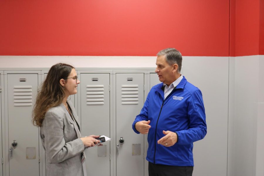 PHS Cutlass editor-in-chief Monika Jurevicius interviews Jay Timmons outside the applied technology rooms after his tour.
