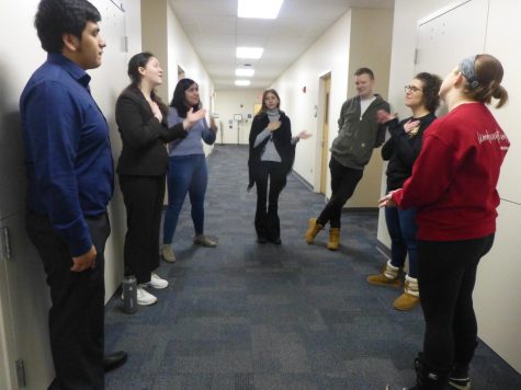 Palatine high school speech team, warming up in the hallway at Harper college on Jan. 28, 2023.  