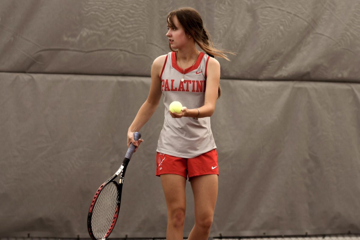 Senior and team captain, Gabija Gricius preparing her serve. “Don’t let the opponents intimidate us,” Gricius said. “Let’s play our own tennis, racket up and dig deep.”