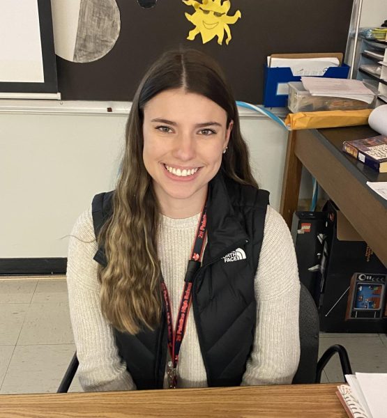 Lauren Christians smiles through her day as she student teaches multiple sections of Astronomy and Earth Science classes throughout first semester.