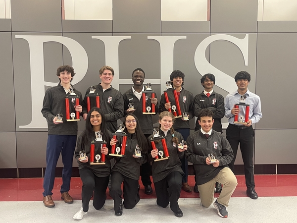PHS Debaters pose with their trophies after the 9th Annual Walk the Plank Debate Tournament