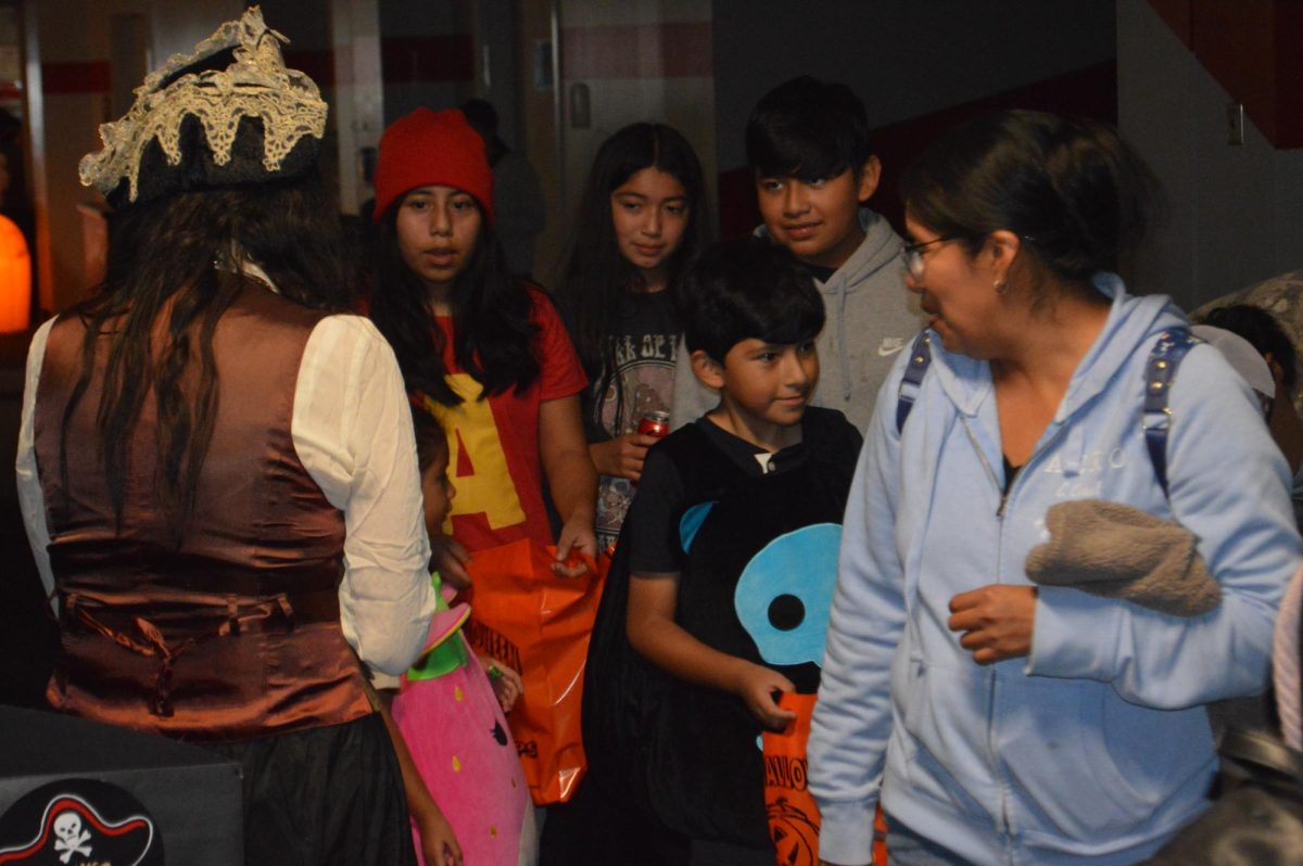 Children of all ages get into costumes to enjoy a night full of trick or treating, and Halloween themed activities. 