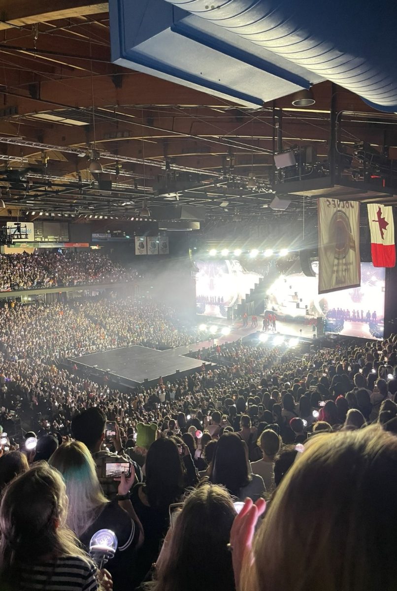 K-pop group SEVENTEEN performs at the Allstate Arena in Rosemont, Illinois. Thousands of fans unite under dazzling lights.