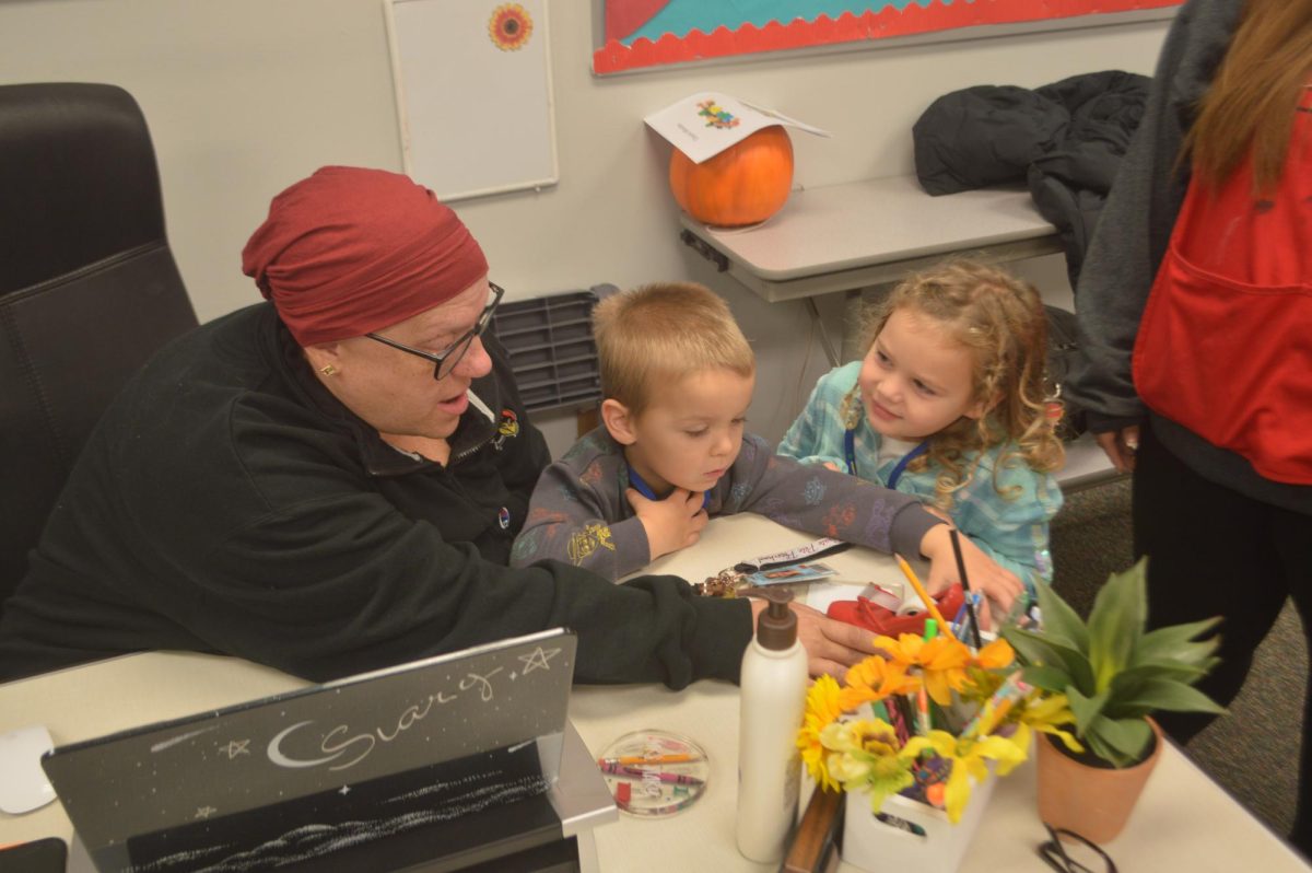 Kris Stary teaches preschool students at Palatine High School's Pirate Pete Preschool. Stary is the lead director of the preschool. 