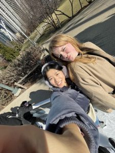 Grace Wang ice skates with her friend at the Maggie Daley Ice Skating Ribbon.