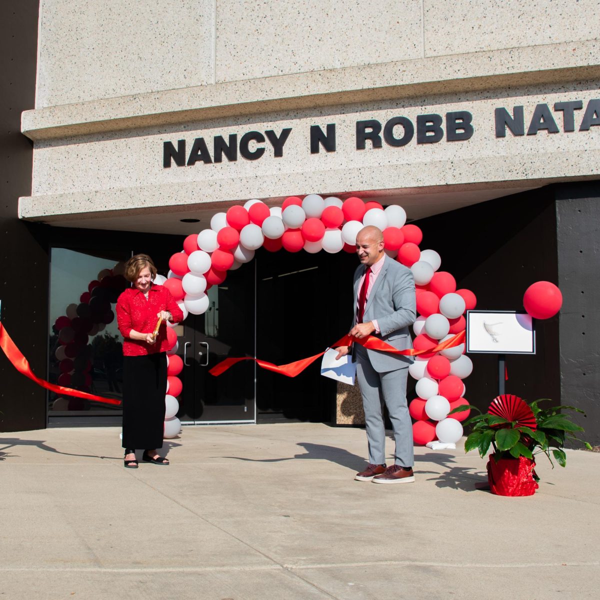 Nancy N. Robb stands alongside Palatine High School Principal Tony Medina at Thursday’s dedication ceremony. (Courtesy of Patrick DeGeorge)