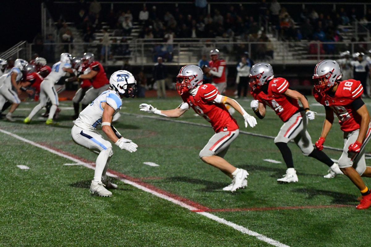 Kole Fager (14) breaks on a route during the win over Prospect.