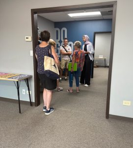 State Rep. Nabeela Syed welcoming supporters into her office on Aug. 16.