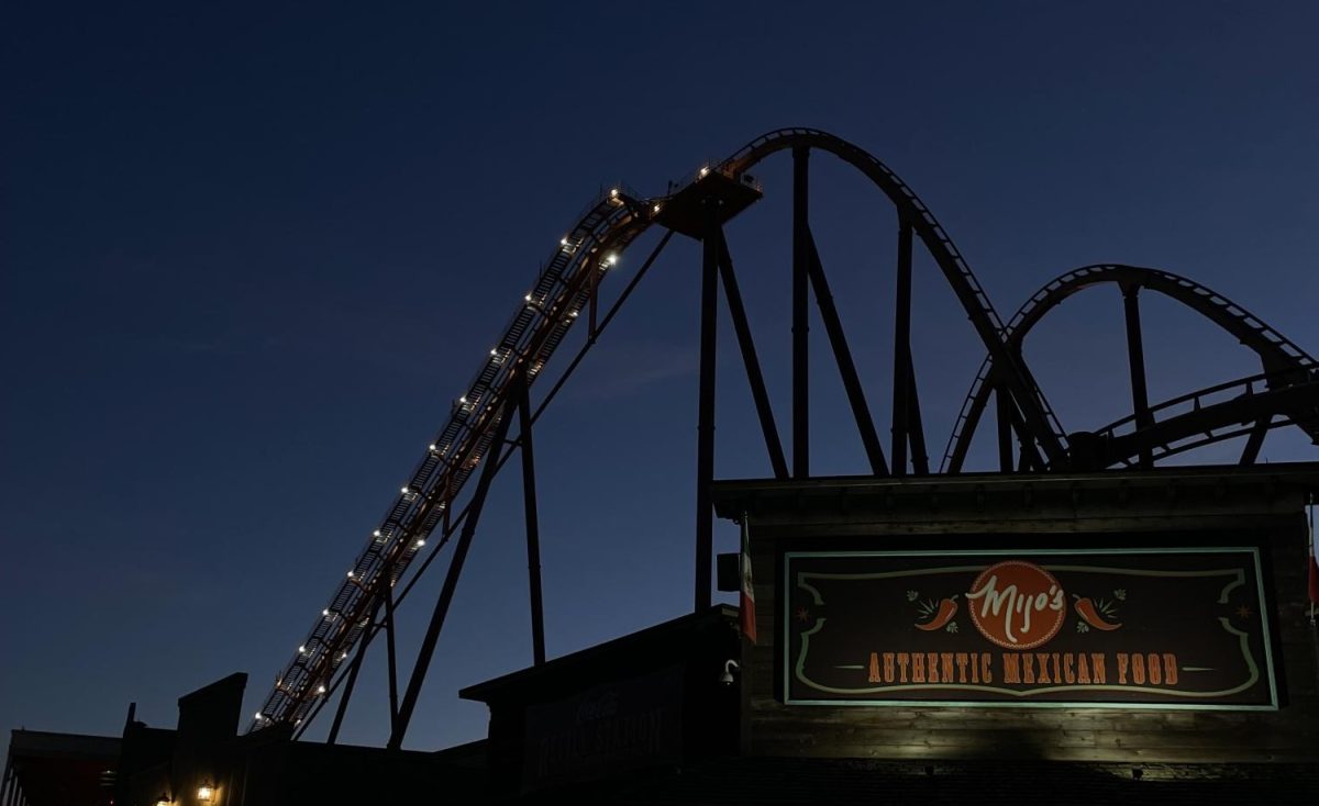 The Raging Bull roller coaster at night during Fright Fest.