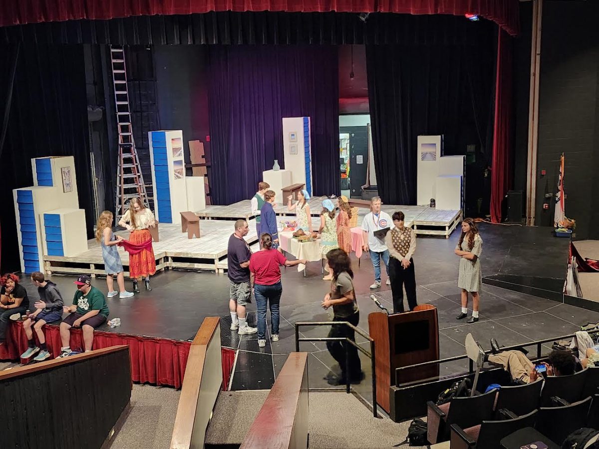 Actors and stage crew on stage during rehearsals for "Shakespeare's The Comedy of Errors." The play will run from Oct. 9 to Oct. 11.