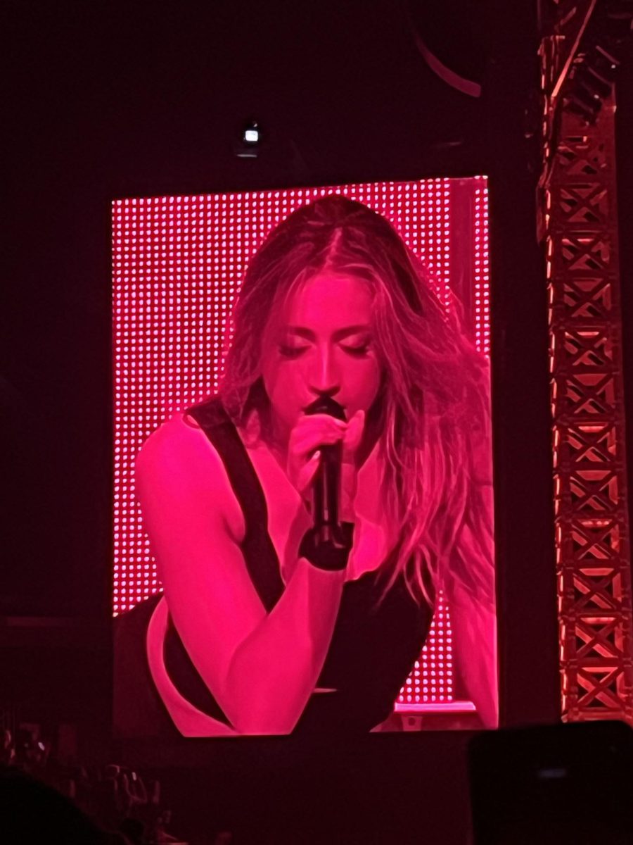 Tate McRae performs in the first act of her show during the "Miss Possessive Tour" on Oct. 21.