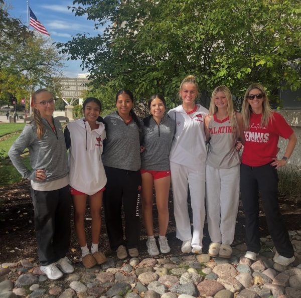 Palatine High School tennis team poses for a photo before sectionals matchups.