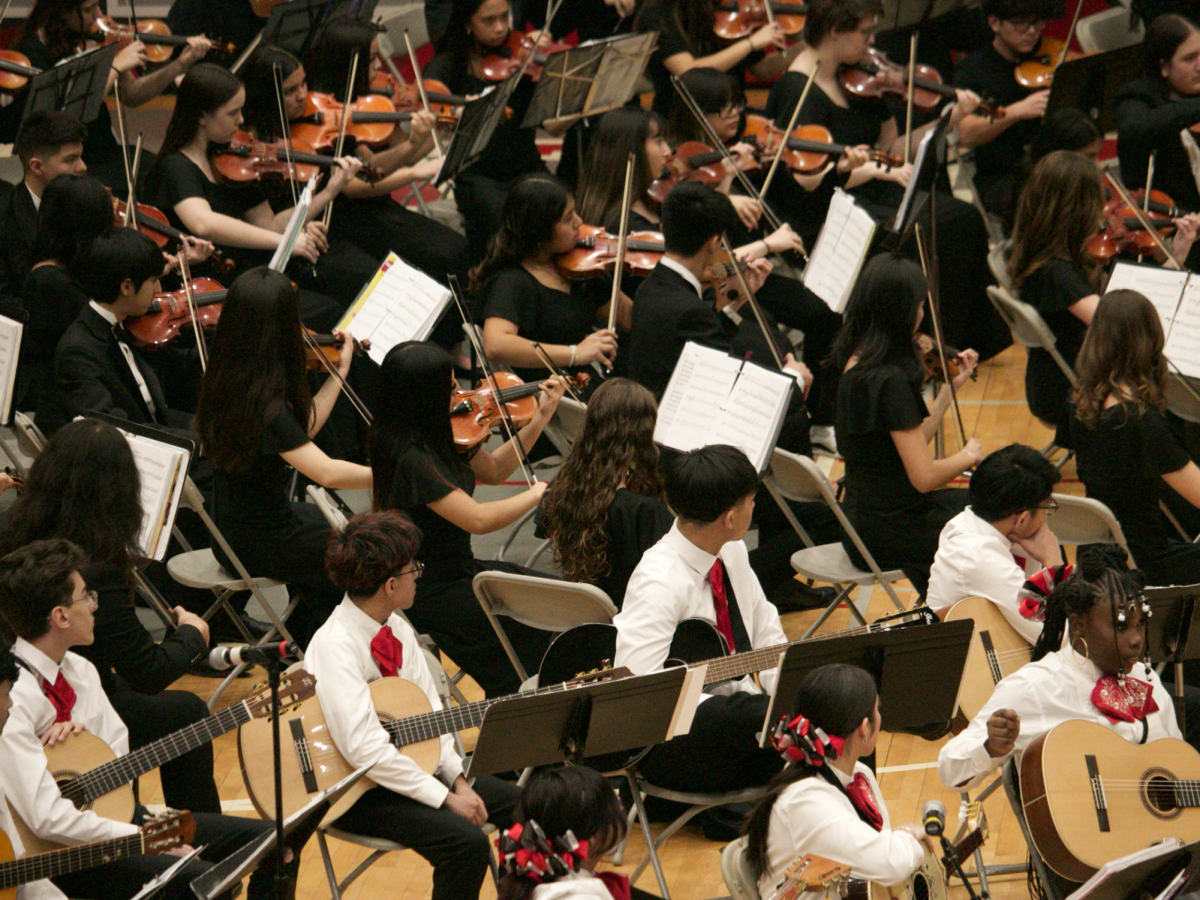 Students play the newly composed piece specifically for the 150th anniversary.