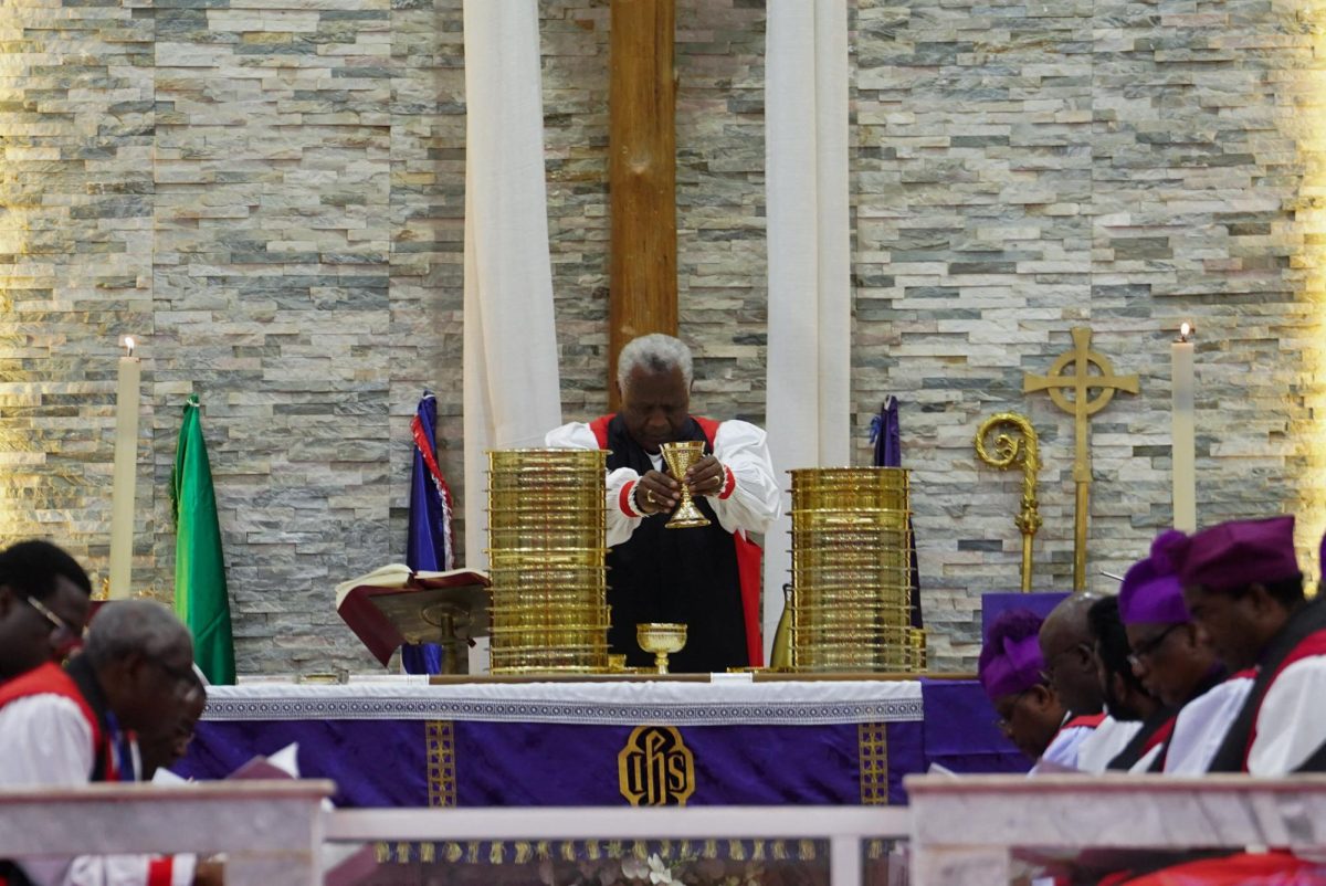Archbishop Laurent Mbanda of Rwanda, newly elected chairman of the Global Anglican Council, prays over the Holy Communion during the closing service of the GAFCON G26 council at the Cathedral Church of the Advent in Abuja, Nigeria, March 6, 2026. REUTERS/Marvellous Durowaiye