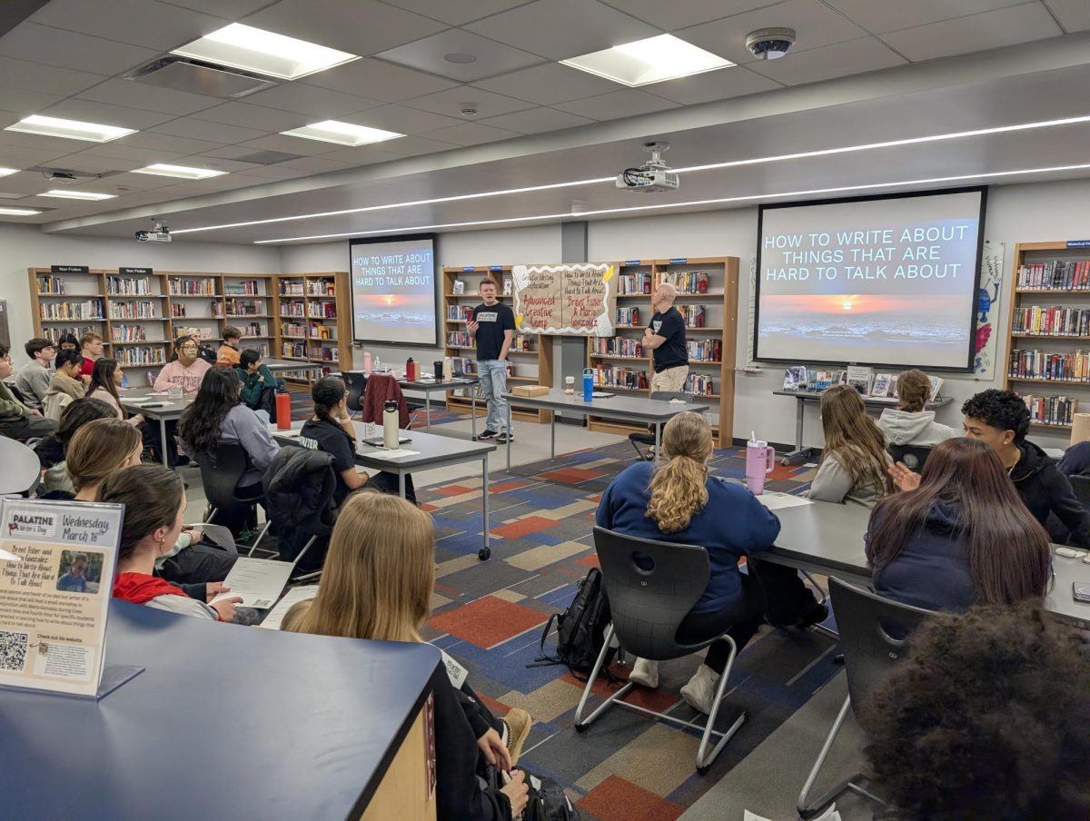 Brent Fisher and Mario Gonzalez lead a workshop, sharing their backgrounds and offering advice on writing about difficult topics.