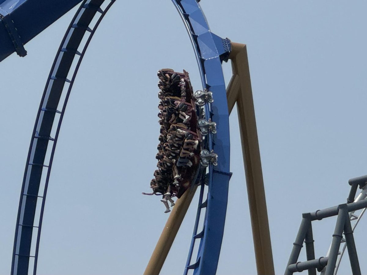 Riders on Wrath of Rakshasa at Six Flags Great America in Gurnee, Ill., on June 10, 2025. Wrath of Rakshasa is the newest ride at Six Flags Great America.