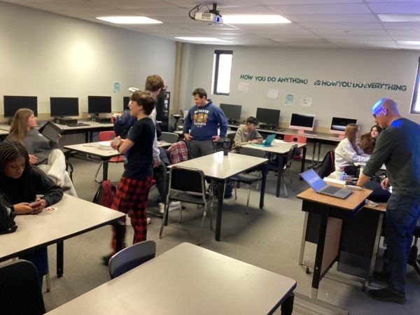 In a lively newsroom, the Cutlass staff works behind the scenes to produce stories that inform and represent their peers.